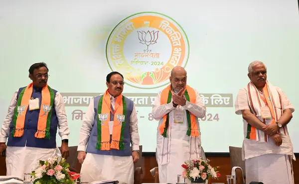 stock image Union Home Minister Amit Shah Union Minister and BJP National President JP Nadda and party National General Secretaries Vinod Tawde and B L Santhosh launching members ship Progamme during BJP National Office Bearers and State Presidents Meeting