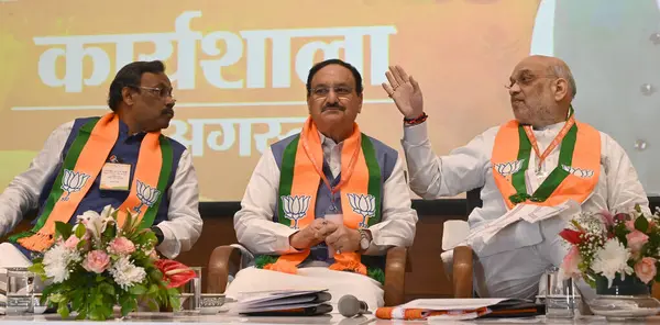 stock image Union Minister and BJP National President JP Nadda talking with Union Home Minister Amit Shah during BJP National Office Bearers and State Presidents Meeting at BJP HQ Extn, on August 17 2024 in New Delhi, India. The Bharatiya Janata Party (B