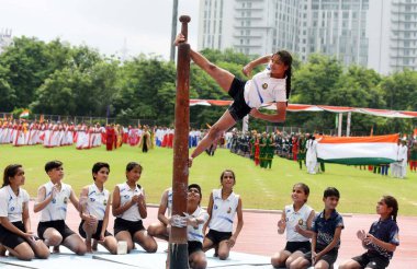 Girls of Bhagwati Arsh Kanya Gurukul perform Mallakhamb during 78th Independence Day celebrations at Tau Devi Lal Stadium in sector-38 near Rajiv chowk, on August 15, 2024 in Gurugram, India. clipart