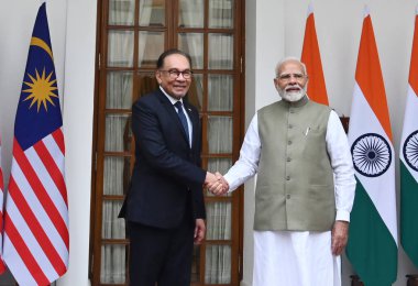  Prime Minister Narendra Modi shakes hand with his Malaysian counterpart Anwar Ibrahim before their delegation level meeting at Hyderabad House on August 20 2024 in New Delhi India.  Photo by Arvind Yadav/Hindustan Times  clipart