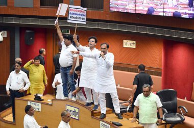 NEW DELHI, INDIA - AUGUST 21: BJP councillors protest during a meeting of the Municipal Corporation of Delhi (MCD), at the Civic Centre on August 21, 2024 in New Delhi, India.  clipart