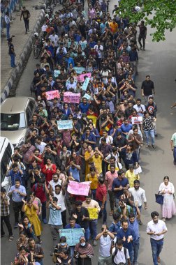 KOLKATA, INDIA - AUGUST 21: Thousands of junior doctors, senior doctors, medical students and other medical professionals take out a protest rally from CGO Complex to Swasthya Bhaban, headquarters of State Health and Family Welfare department  clipart