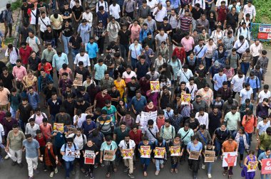 KOLKATA, INDIA - AUGUST 21: Thousands of junior doctors, senior doctors, medical students and other medical professionals take out a protest rally from CGO Complex to Swasthya Bhaban, headquarters of State Health and Family Welfare department  clipart