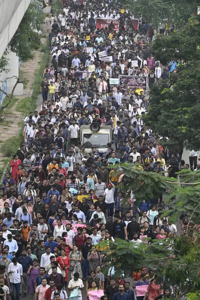 stock image KOLKATA, INDIA - AUGUST 21: Thousands of junior doctors, senior doctors, medical students and other medical professionals take out a protest rally from CGO Complex to Swasthya Bhaban, headquarters of State Health and Family Welfare department 