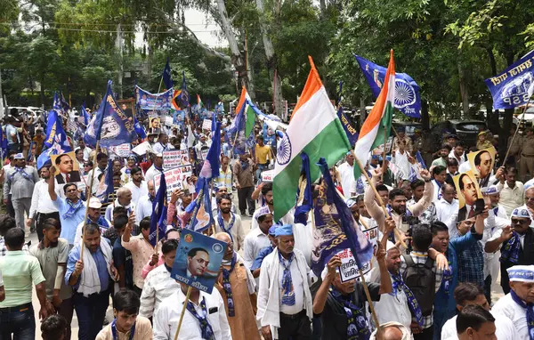 stock image GHAZIABAD, INDIA - AUGUST 21: BSP workers take out protest march during  Bharat Bandh against the Supreme Court's decision on creamy layer in Scheduled Caste and Scheduled Tribe reservation on hapur road dm office  on August 21, 2024 in Ghaziabad