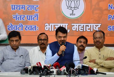 MUMBAI, INDIA - JUNE 5: Maharashtra Deputy CM Devendra Fadnavis along with BJP leaders addressing the media at BJP office on June 5 ,2024 in Mumbai, India. BJP leader Devendra Fadnavis offered to resign as Maharashtra Deputy Chief Minister  clipart