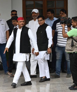 NEW DELHI INDIA - JUNE 1 Samajwadi party leader Akhilesh Yadav Ram Gopal Yadav during INDIA bloc leaders meeting at Kharges residence on June 1 2024 in New Delhi India. The INDIA bloc meeting in Delhi to discuss the future course of action aft clipart