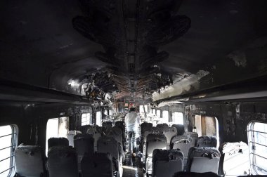 NEW DELHI  INDIA - JUNE 3  2024  Firefighters and passengers on tracks after a fire broke out in the Taj Express  near Sarita Vihar  on June 3  2024 in New Delhi  India. The blaze broke out between the Okhla and Tughlakabad railway stations. The trai clipart