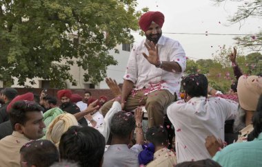 LUDHIANA  INDIA - JUNE 4  2024  Congress Ludhiana candidate Amrinder Singh Raja Warring along with party workers celebrating after victory in Lok Sabha elections  on June 4  2024 in Ludhiana  India.  (Photo by Gurpreet Singh/Hindustan Times) clipart