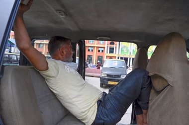 NEW DELHI INDIA AUGUST 22 2024 Taxis and auto rickshaws stand parked outside New Delhi Railway Station during a 2-day strike called by auto and taxi driver unions to protest against the app-based cab services on August 22 2024 in New Delhi India. Pho clipart