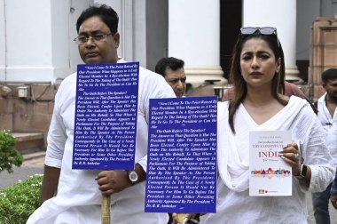 KOLKATA INDIA JUNE 27 2024 Two newly elected Trinamool Congress TMC MLA in West Bengal Sayantika Banerjee and Rayat Hossain Sarkar hold a protest 2nd day in front of the statue of B R Ambedkar at the Assembly premises after West Bengal Governor CV An clipart