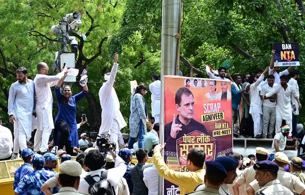 stock image NEW DELHI INDIA JUNE 27 2024 IYC supporters shout slogans holding placards during protest against NTA and re examination of NEET Exams by Indian Youth Congress at Jantar Mantar on June 27 2024 in New Delhi India Indian Youth Congress IYC demonstratio