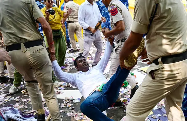 stock image NEW DELHI INDIA JUNE 27 2024 IYC supporters shout slogans holding placards as they detained by the police during protest against NTA and re examination of NEET Exams by Indian Youth Congress at Jantar Mantar on June 27 2024 in New Delhi India Indian 