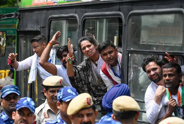 stock image NEW DELHI INDIA JUNE 27 2024 IYC supporters shout slogans holding placards as they detained by the police during protest against NTA and re examination of NEET Exams by Indian Youth Congress at Jantar Mantar on June 27 2024 in New Delhi India Indian 