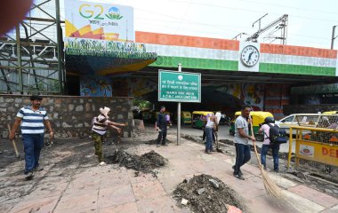 NEW DELHI INDIA JUNE 29 2024 NDMC worker cleaning drive and traffic open at Minto road after one day before yesterday Heavy rainfall on June 29 2024 in New Delhi India The India Meteorological Department IMD predicts heavy to very heavy rainfall in D clipart