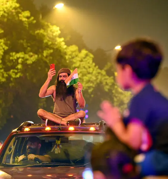 stock image NEW DELHI INDIA JUNE 30 2024 Fans celebrate on a road near the India Gate after India won the T20 World Cup 2024 on June 30 2024 in New Delhi India Celebrations erupted Saturday night across cricketcrazy India as its team won the T20 World Cup with f