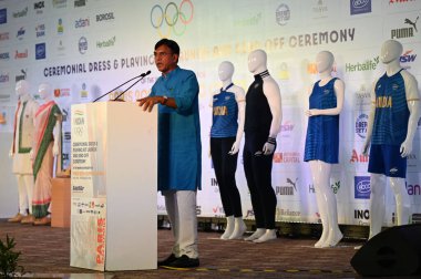 NEW DELHI INDIA JUNE 30 2024 Union Minister of Youth Affairs and Sports Dr Mansukh Mandaviya President Indian Olympic Dr PT Usha at the launch of INDIA Olympic dress and playing kit on June 30 2024 in New Delhi India During the event Union Minister clipart