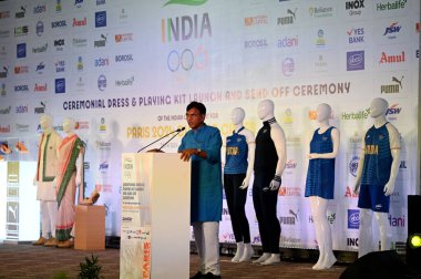 NEW DELHI INDIA JUNE 30 2024 Union Minister of Youth Affairs and Sports Dr Mansukh Mandaviya President Indian Olympic Dr PT Usha at the launch of INDIA Olympic dress and playing kit on June 30 2024 in New Delhi India During the event Union Minister clipart