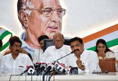 MUMBAI, INDIA - JUNE 6 2024 NCP (Sharadchandra Pawar) chief Sharad Pawar, NCP (Sharadchandra Pawar) party leader Jayant Patil, along with meet newly-elected MPs of his party addressing the media on June 6, 2024 in Mumbai, India. (Photo by Bhushan Koy clipart