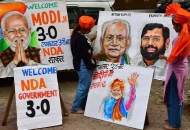 MUMBAI, INDIA JUNE 8 2024   Students of Gurukul School of Art draw portraits of Narendra Modi and other political leaders ahead of Narendra Modi's 3.0 oath-taking ceremony as India's prime minister tomorrow, at Lalbaug, on June 8, 2024 in Mumbai, Ind clipart