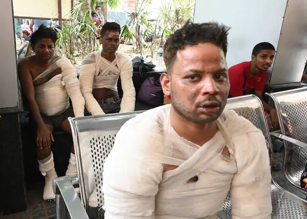 stock image NEW DELHI, INDIA JUNE 8 2024   Victims at Safdarjung hospital after a fire broke out in Dal factory early morning in Nerala industrial area H block , on June 8, 2024 in New Delhi, India. At least three workers were killed while six others critically 