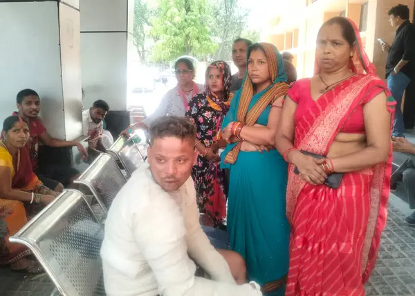 stock image NEW DELHI, INDIA JUNE 8 2024   Family members of victims at Safdarjung hospital after a fire broke out in Dal factory early morning in Nerala industrial area H block , on June 8, 2024 in New Delhi, India. At least three workers were killed while six 