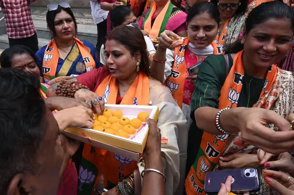 stock image NAVI MUMBAI, INDIA JUNE 8 2024   Ex MP Dr Sanjeev Naik , BJP Leader along with the BJP party workers celebrates on PM Narendra Modi for the third time at Chhatrapati Shivaji Maharaj Chowk, Vashi, on June 8, 2024 in Navi Mumbai, India. (Photo by Bachc