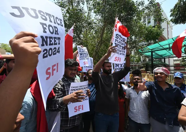 stock image PATNA, INDIA JUNE 10 2024   JNUSU activists protest shouting slogans against massive corruption in NEET results, demanding enquiry into the NEET results against corrupt NTA during the Join protest demo at the Ministry of Education at Shastri Bhawan, 