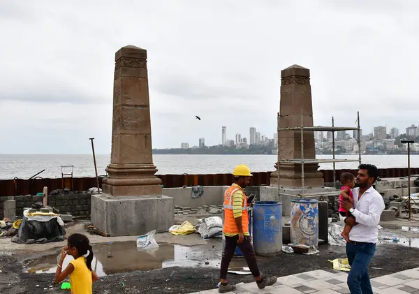 stock image MUMBAI INDIA JUNE 10 2024 Brihanmumbai Municipal Corporation BMC workers have restored the century old Parsi Gate at the Marine Drive promenade over two years after it was dismantled for the Mumbai Coastal Road project