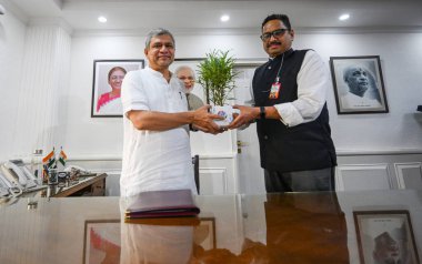 NEW DELHI INDIA JUNE 11 2024   BJP MP Ashwini Vaishnaw being greeted by Sanjay Jaju Secretary Ministry of Information and Broadcasting as he arrives to assume charge as Information and Broadcasting Minister a day after the portfolio allocation at Sha clipart