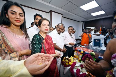 NEW DELHI INDIA JUNE 11 2024   Union Minister of Steel and Heavy Industries HD Kumaraswamy with family members offers prayers before assuming office at Udyog Bhawan on June 11 2024 in New Delhi India.  Photo by Sanjeev Verma/Hindustan Times  clipart