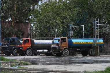 NEW DELHI INDIA JUNE 12 2024   Delhi Jal Board water supply tanker refilling at Govind Puri Jal Board on June 12 2024 in New Delhi India.  Photo by Salman Ali/Hindustan Times  clipart