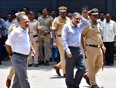 MUMBAI INDIA JUNE 12 2024   Mumbai Police Commissioner Vivek Phansalkar and Spl. Commissioner of Police Deven Bharti paid their last respects to MCA  Mumbai Cricket Association  president Amol Kale at MCA Wankhade on June 12 2024 in Mumbai India. MCA clipart