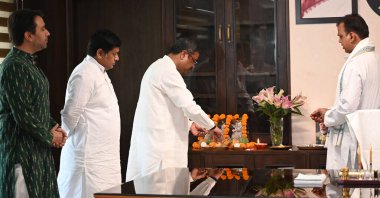 NEW DELHI INDIA JUNE 13 2024    BJP MP Dharmendra Pradhan offers prayers before assuming charge as Minister of Education at Shastri Bhawan  on June 13 2024 in New Delhi India. Ministers of State Jayant Chaudhary and Sukanta Majumdar are also seen.  P clipart