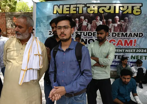 stock image NEW DELHI INDIA JUNE 12 2024   NEET exam candidate Harsh with his Father sit on protest  for cancellation and conduct of Neet Re Exam  at Jantar Mantar on June 12 2024 in New Delhi India.  Photo by Sonu Mehta/Hindustan Times 