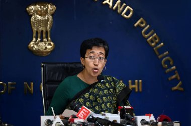 NEW DELHI INDIA JUNE 15 2024   Delhi Cabinet Minister Atishi addresses a press conference over the shortage of water at Delhi Secretariat on June 15 2024 in New Delhi India. In view of the water shortage in the national capital the Delhi government h clipart