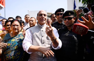 LUCKNOW INDIA MAY 4 2023 Defence Minister of India Rajnath Singh shows inked finger exiting the booth after casting his vote during the local bodies election at Scholer s home polling booth Gomti Nagar on May 4 2023 in Lucknow India Photo by Deepak G clipart