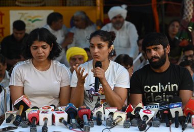 NEW DELHI INDIA MAY 6 2023 Protesting Wrestlers Sakshi Malik Vinesh Phogat and Bajrang Punia briefs media personnel at Jantar Mantar on May 6 2023 in New Delhi India Wrestlers resumed their protest against WFI and its President Brij Bhushan Sharan Si clipart