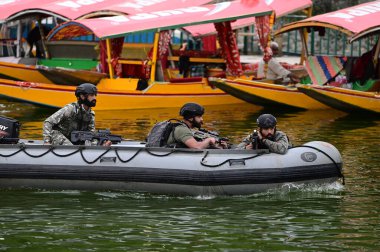 SRINAGAR INDIA MAY 17 2023 Navy s Marine Commandos MARCOS patrol ahead of upcoming G20 meeting in Dal Lake on May 17 2023 in Srinagar India Photo By Waseem Andrabi Hindustan Times  clipart