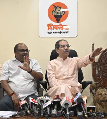 MUMBAI INDIA MAY 12 2023 Shiv Sena UBT chief Uddhav Thackeray alongside party leader MLA Anil Parab addresses the media during a press conference at Matoshree Bandra East on May 12 2023 in Mumbai India Photo by Vijay Bate Hindustan Times  clipart