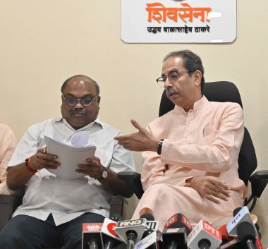 MUMBAI INDIA MAY 12 2023 Shiv Sena UBT chief Uddhav Thackeray alongside party leader MLA Anil Parab addresses the media during a press conference at Matoshree Bandra East on May 12 2023 in Mumbai India Photo by Vijay Bate Hindustan Times  clipart