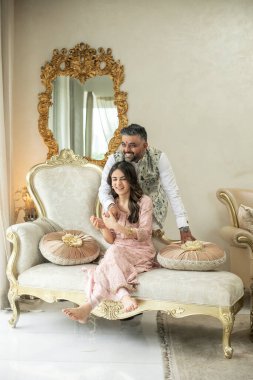 NEW DELHI, INDIA - AUGUST 16, 2023: Bollywood Actress Radhikka Madan with her brother, businessman Arjun Madan pose during an exclusive interview with HT City for the Raksha Bandhan celebrations clipart