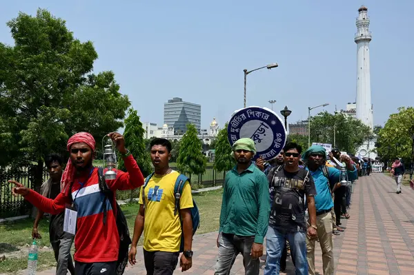 stock image KOLKATA INDIA MAY 17 2023 West Bengal Group D empanelled candidates participate in a rally with Kerosene Lantern protesting against alleged irregularities in Group D recruitment in schools and demand jobs for all eligible candidates at Esplanade on M