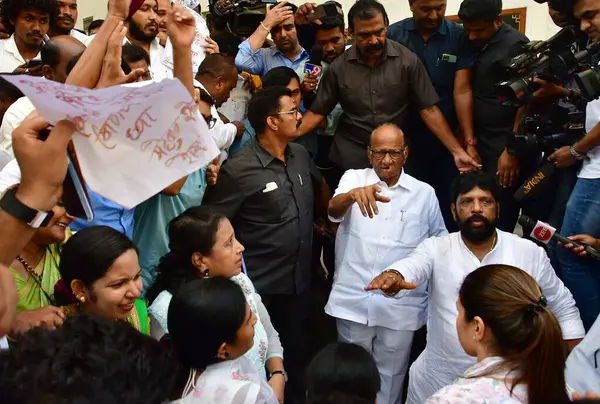 stock image MUMBAI INDIA MAY 4 2023 Nationalist Congress Party supremo NCP Sharad Pawar interacts with party workers and supporters during their dharna urging him to reconsider his resignation from the post of party president at Y B Chavan Centre Nariman Point o