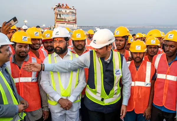 stock image MUMBAI INDIA MAY 24 2023 Chief Minister Eknath Shinde and DCM Devendra Fadnavis flag off a bus on a short distance on the newly completed Mumbai Trans Harbour Link MTHL on May 24 2023 in Mumbai India The link will be the longest sea bridge in India T