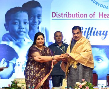 MUMBAI INDIA MAY 9 2023 Union Minister Nitin Gadkari with singer Anuradha Paudwal during the distribution of free hearing aids event by Suryodaya Foundation at Bandra on May 9 2023 in Mumbai India Photo by Vijay Bate HT Photo  clipart