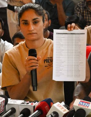 New Delhi India May 14 2023 2023 Protesting Wrestler Vinesh Phogat showing the letter they have written to the Women BJP MP s to come and support them during the press conference at Jantar Mantar on May 14 2023 in New Delhi India Photo by Vipin Kumar clipart