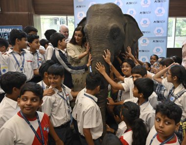 MUMBAI INDIA MAY 5 2023 Bollywood actor Dia Mirza and People for the Ethical Treatment of Animals PETA unveil a stunningly realistic life size animatronic elephant named Ellie who will be visiting schools across India to teach empathy for animals to  clipart