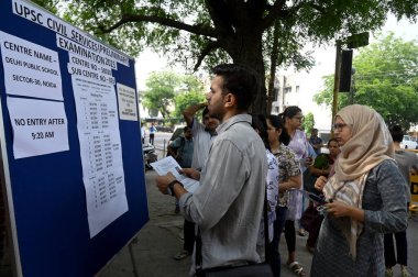 NOIDA INDIA MAY 28 2023 Aspirants queue for Union Public Service Commission UPSC Civil Services Preliminary Exam at Delhi Public School Sector 30 on May 28 2023 in Noida India Photo by Sunil Ghosh Hindustan Times  clipart