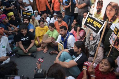 NEW DELHI INDIA MAY 15 2023 Protesting Wrestlers Vinesh Phogat Shakhi Malik with Bhim Army President Chander Shekhar Ravan took out a solidarity march from Jantar Mantar to Palika Bazar on May 15 2023 in New Delhi India Photo by Vipin Kumar Hindustan clipart